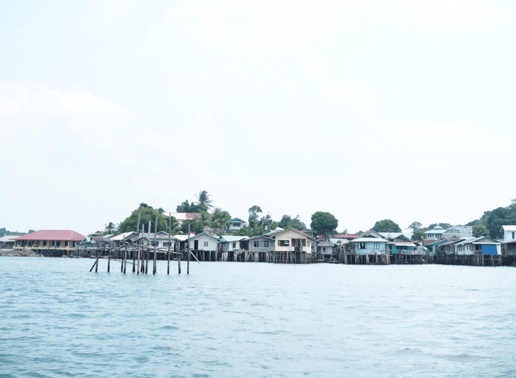 One of the many over-water villages we went past on our ferry, Indonesia